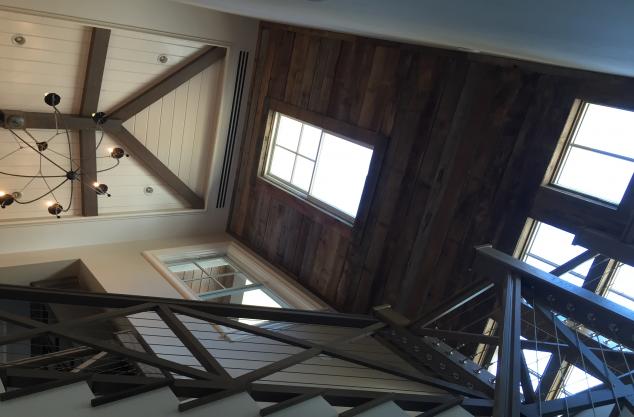 custom beam stair tower ceiling, reclaimed wall