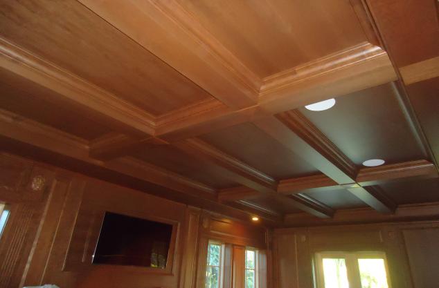 Custom ceiling paneling and beams finished 