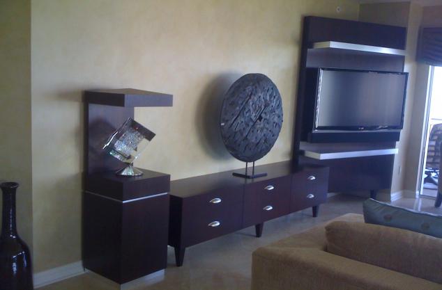 Bonita bay, custom sculpture stand from Weny custom veneer with a custom stain cv to match existing unit.